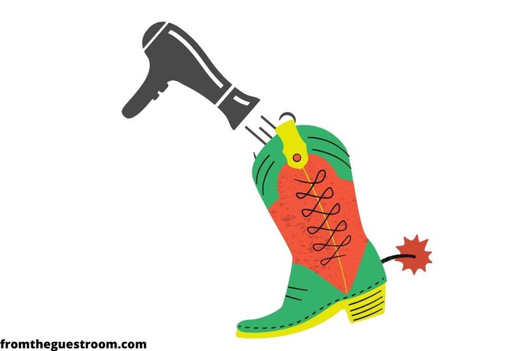 Use hairdryer to stretch a cowboy boot