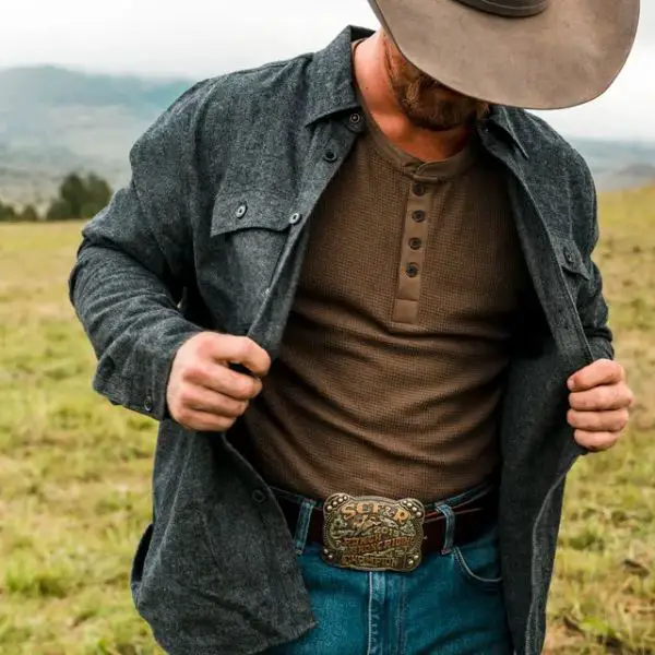 A man wears Flannel Overshirt with Jeans and a T-shirt