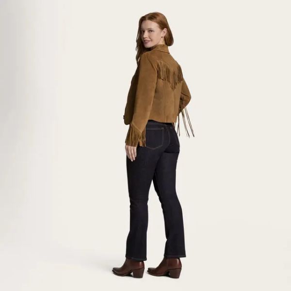 A women wears jeans with t shirt and suede frige leather coat from Tecovas 2