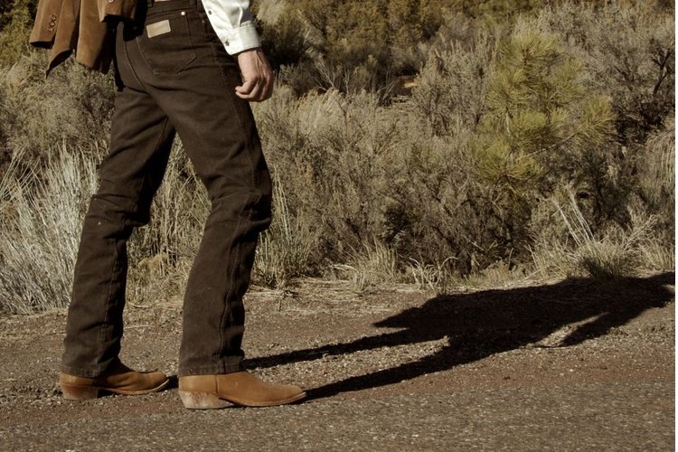 Men walking in cowboy boots