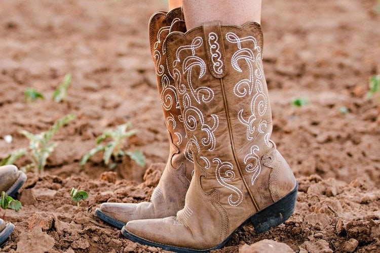women walk in cowboy boots