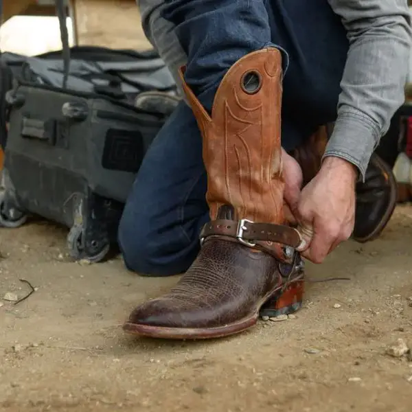 A man wears the prescott cowboy boot