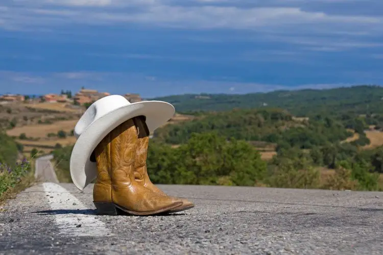 Cowboy boots and hat on the street