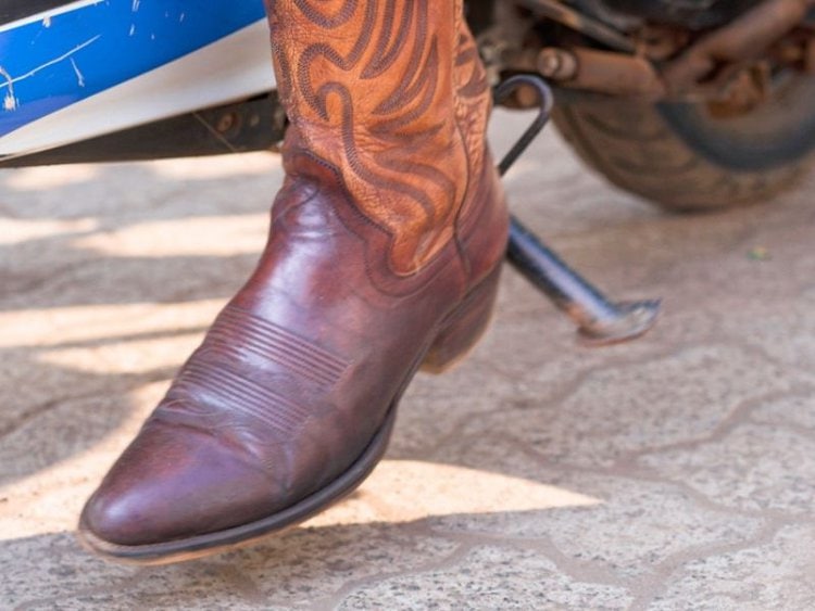Riding motorcycle with cowboy boots