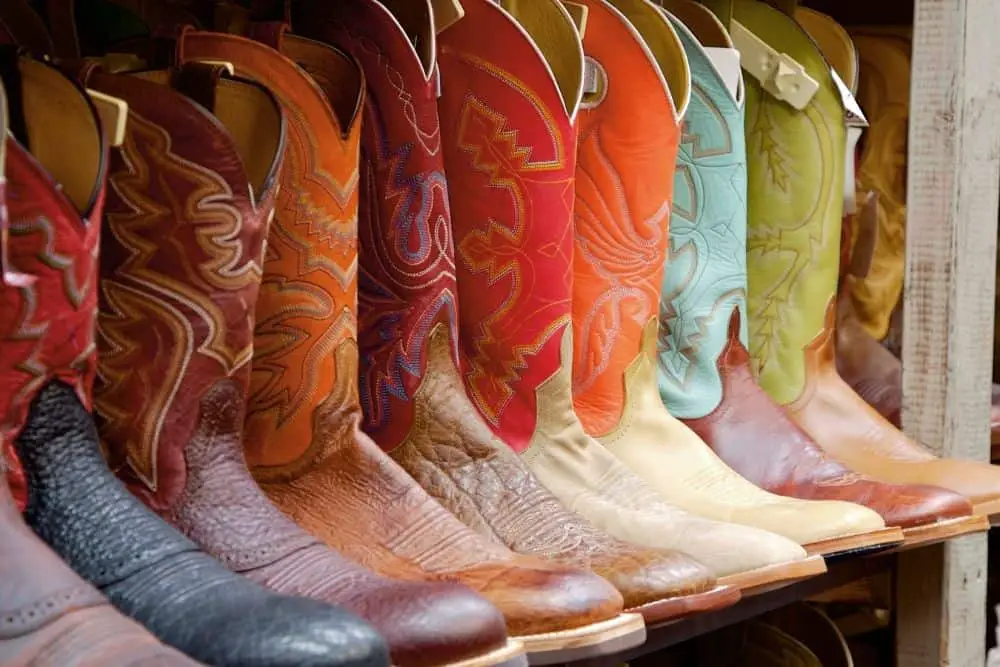 Many cowboy boots on display