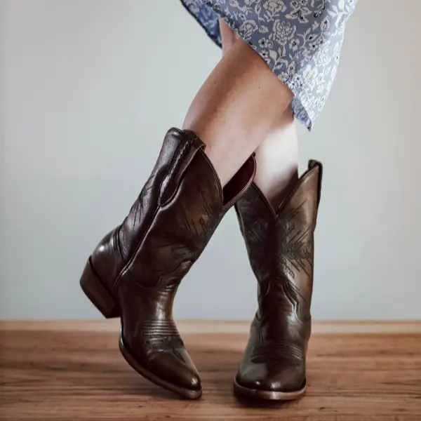 a woman wears dress with Chisos No 3 cowboy boots
