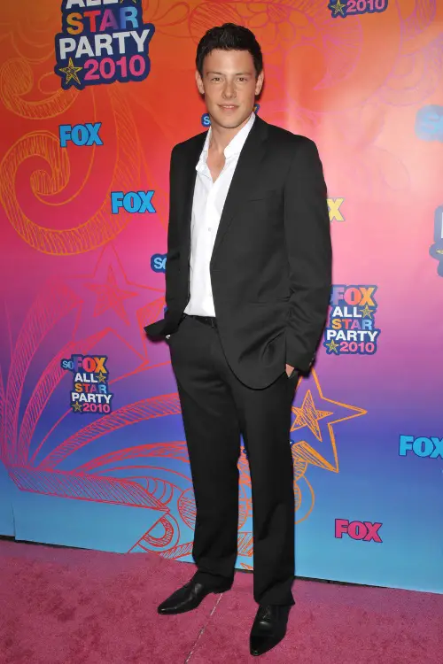 star of Glee wearing a suit with cowboy boots - at Fox TV's All Star Party at Santa Monica Pier