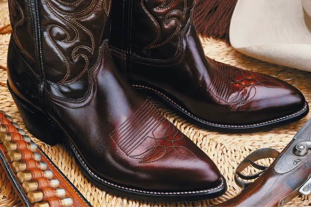 A pair of cowboy boots with smooth surface