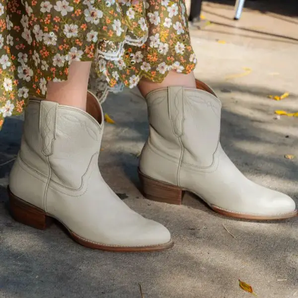 woman wears The Paige boots from Tecovas