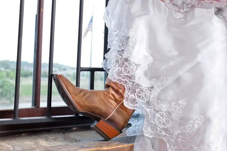 Cowboy boot and wedding dress