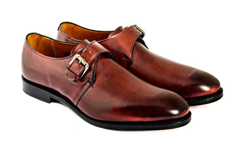 brown polished monk shoes