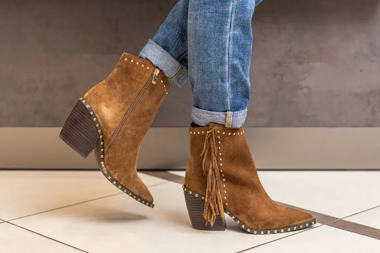 Women wear shortie cowboy boots