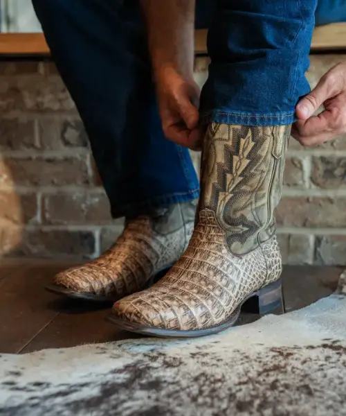 A man wears The William Cowboy Boots