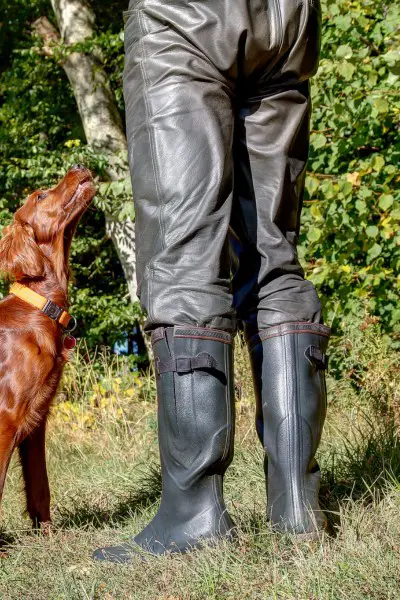 A man wears snake boots