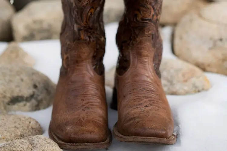 Cowboy boots in snow