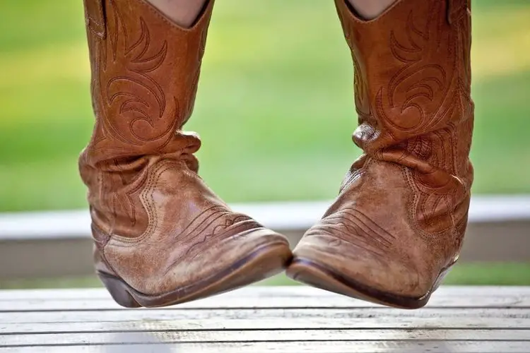 Crack brown cowboy boots