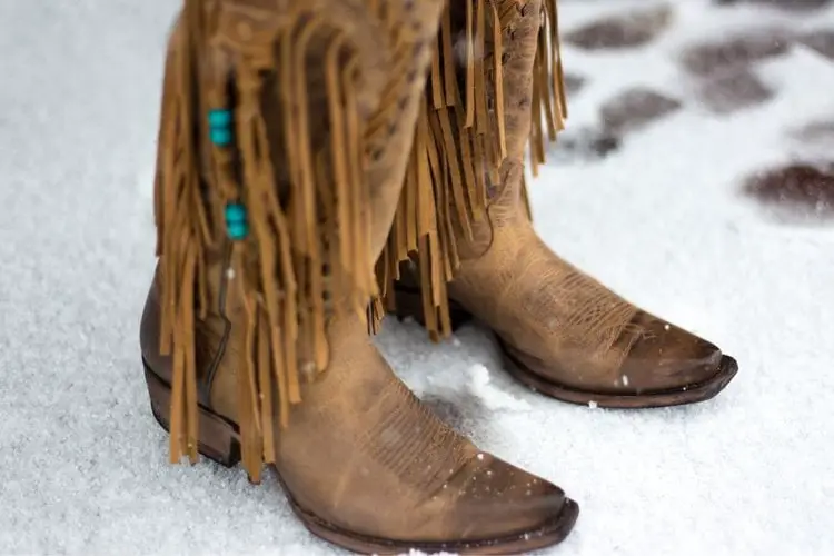Women wear cowboy boots in the winter