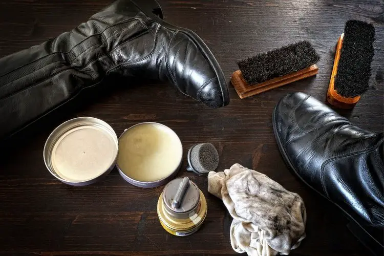 shoe polish, brushes, cloth and cowboy boots