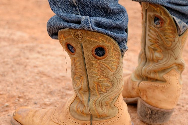 Cowboy boots with pull holes