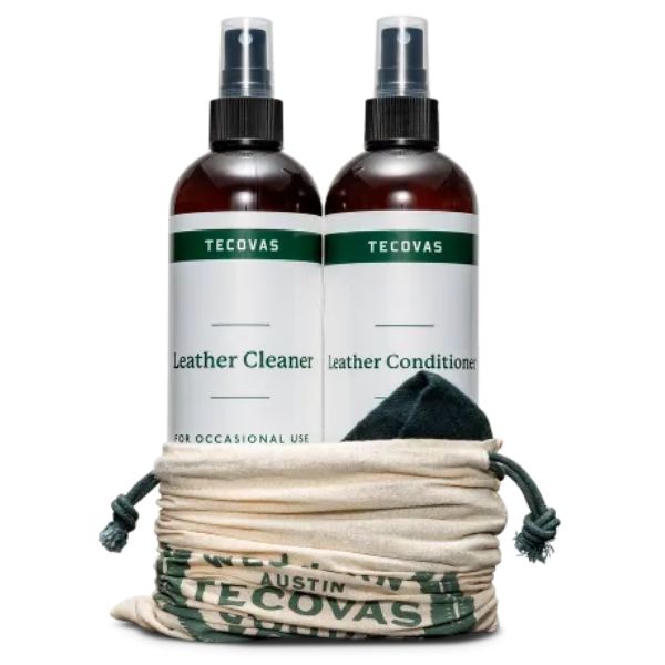 A bag of Tecovas leather cleaner and leather conditioner with a cloth