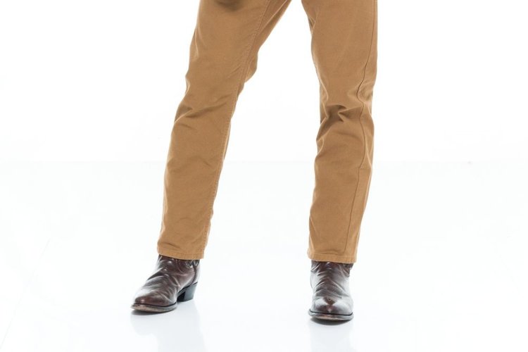 long khaki pants with cowboy boots 