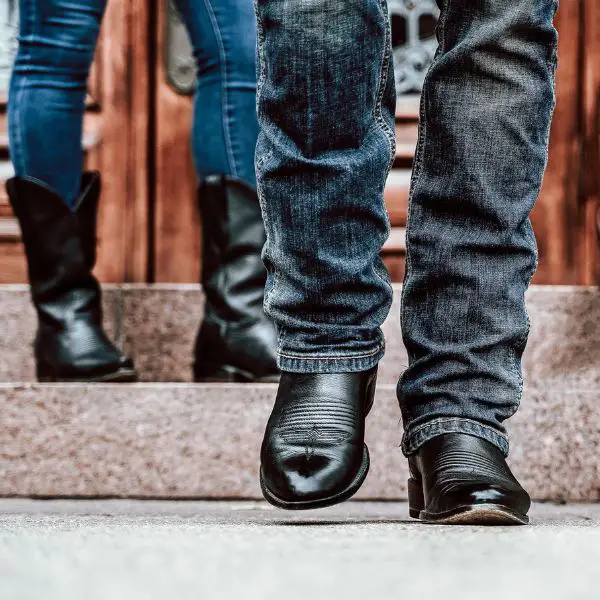 A man wears Chisos No.1 with dark blue jeans