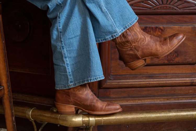 Women wear The Jamie Boots from Tecovas sit in the house