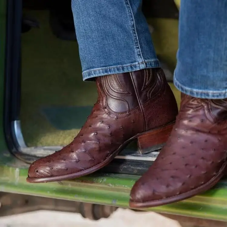 man wears The Wyatt boots from Tecovas