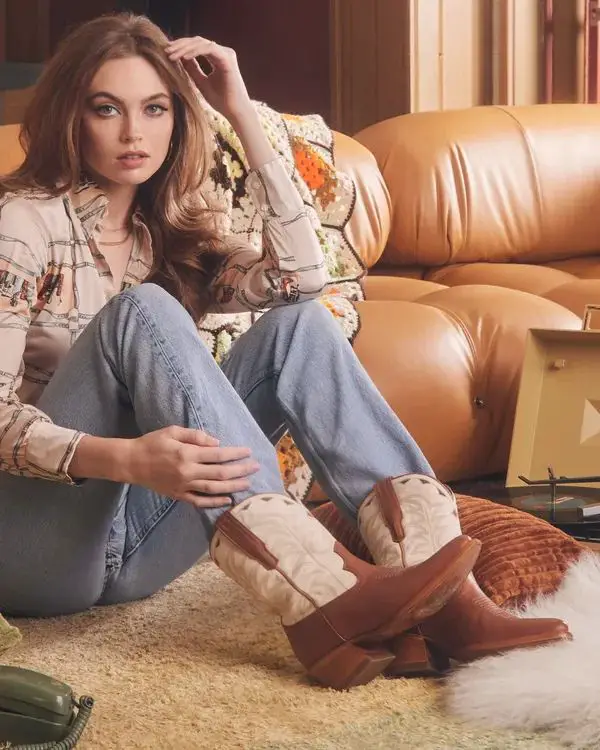 a woman wears The Jolene ankle boots from Tecovas