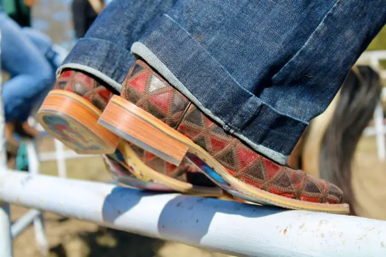 Cuffed jeans with cowboy boots