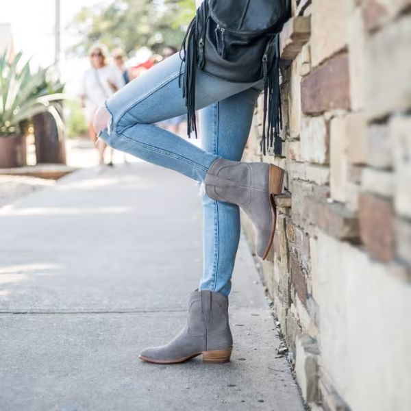 Girl wearing The Lucy Boots from Tecovas on the street
