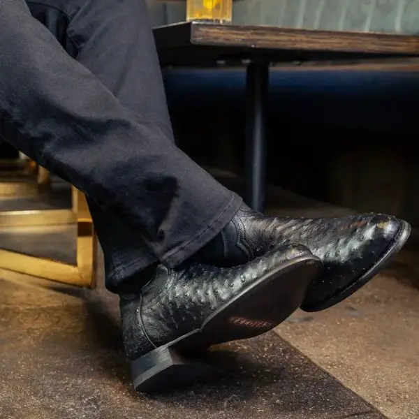 Man wear The Duke Boots from Tecovas with black jeans