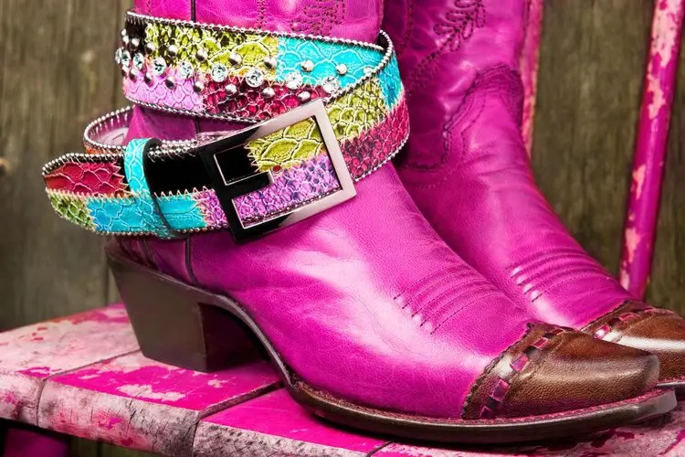 Pink cowboy boots and the colored belt