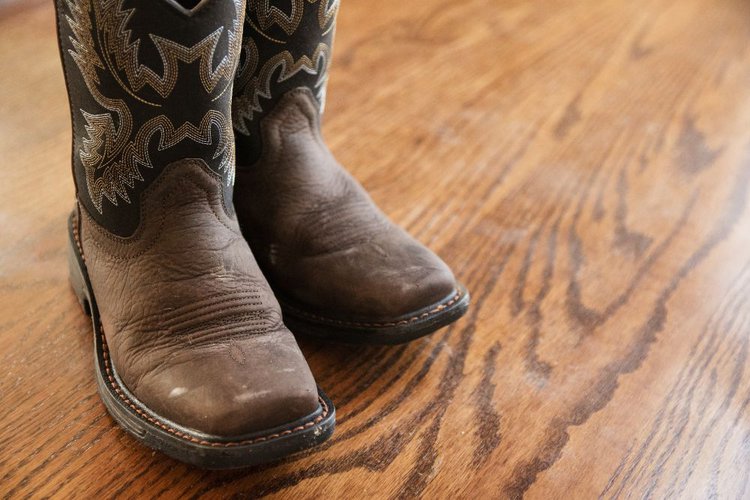 Cowboy boots on the wooden floor