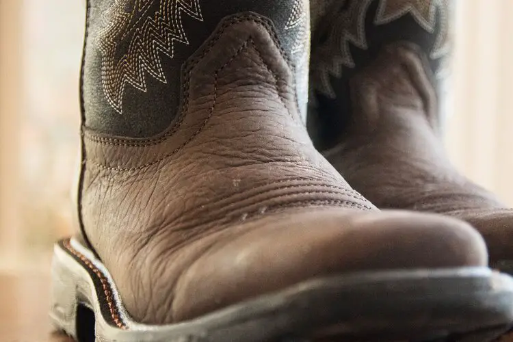 Creases on the vamp of cowboy boots