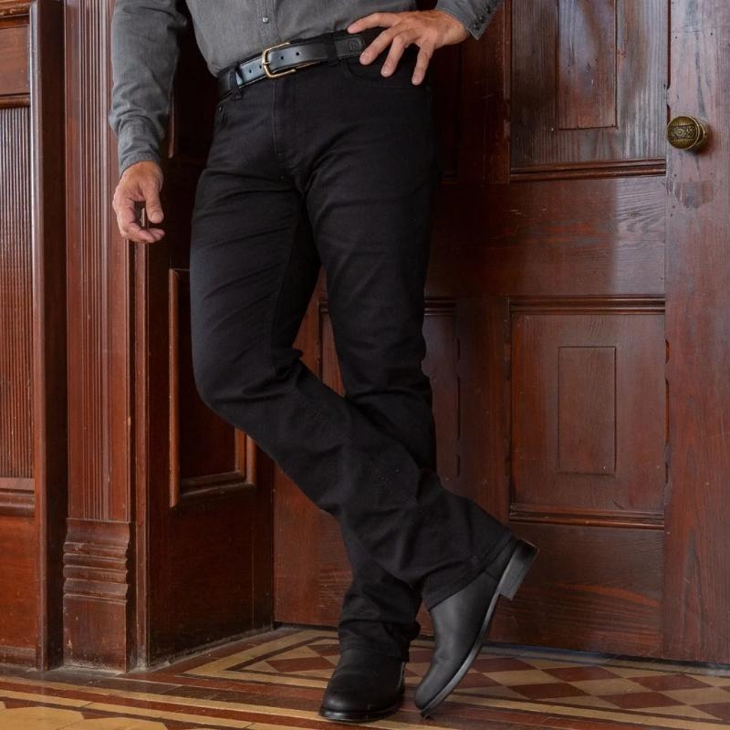 Man wear black cowboy boots, black jeans and shirts