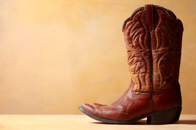 cowboy boots curling up result in wrinkles on the surface