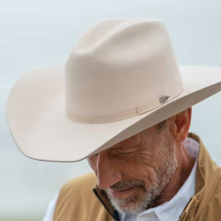 old man wears The Ranchman white cowboy hat from Tecovas