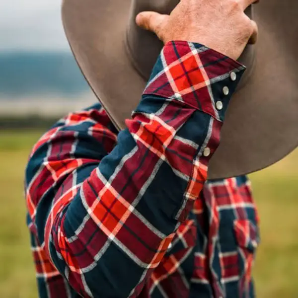 Man wear a cotton pearl snap shirt
