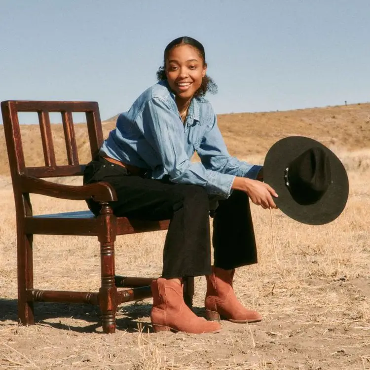 A girl wears The Lucy Western Booties