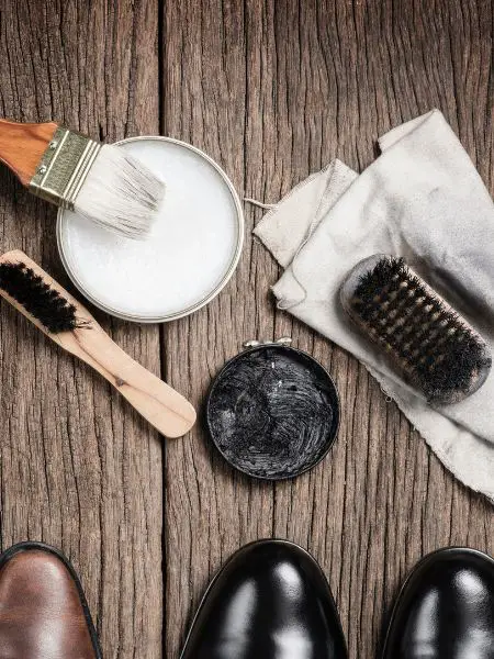 Clean leather cowboy boots with saddle soap