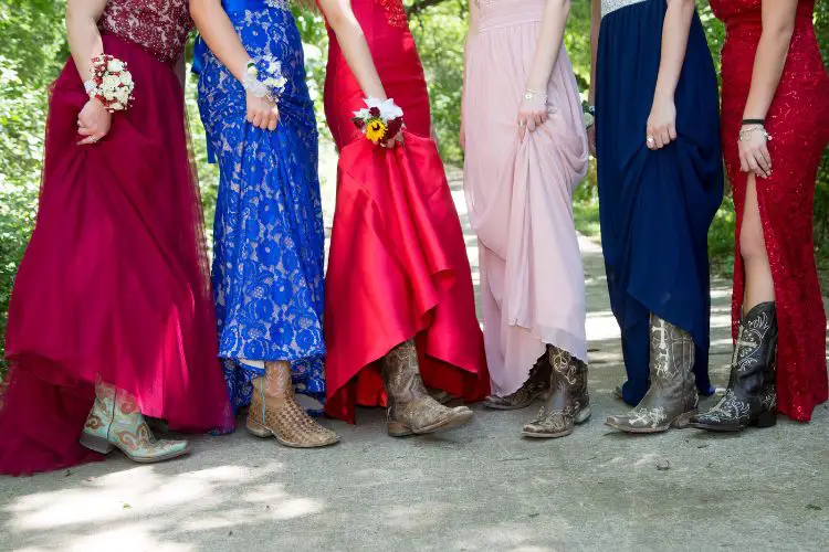 Women wear prom dresses with cowboy boots
