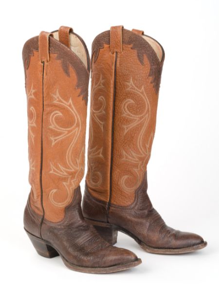 A pair of tall cowboy boots