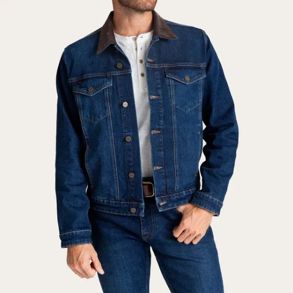 Man wears Tecovas denim trucker jacket