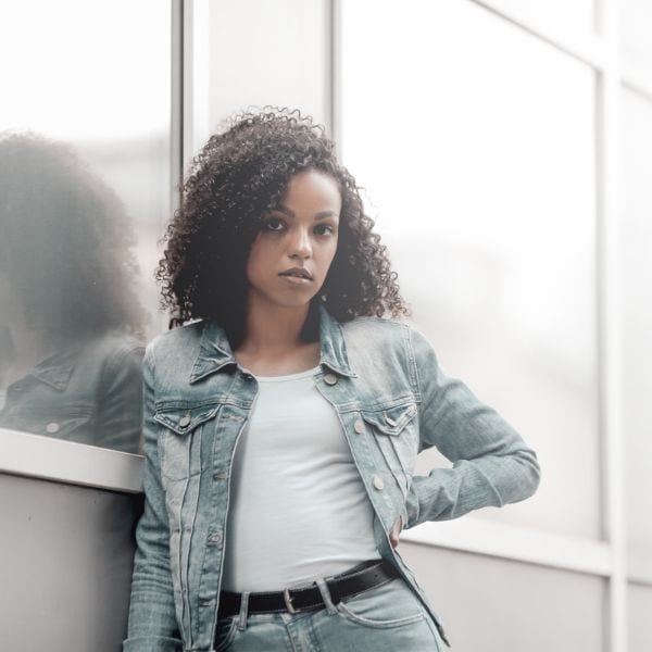 A woman wears denim on denim