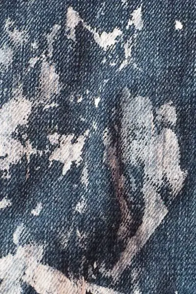 Fade paint on jeans