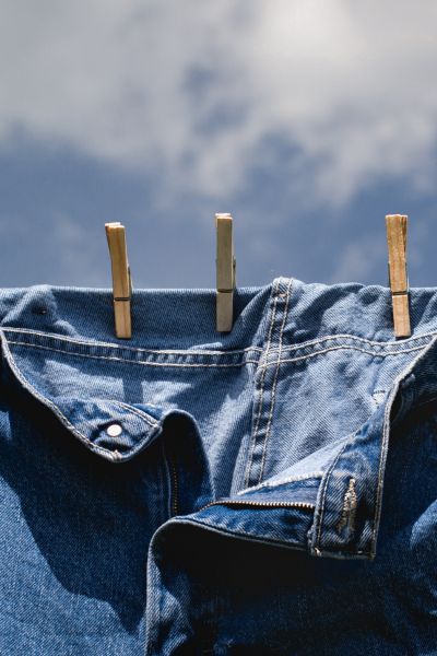 Hanging denim jeans under the sun