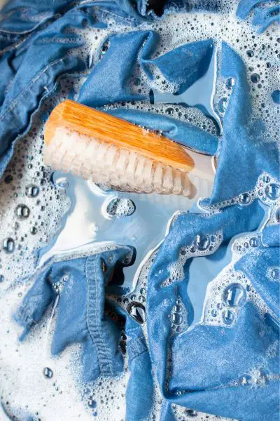 Jeans and washing brush