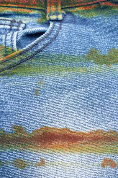 Oil stain on denim jeans