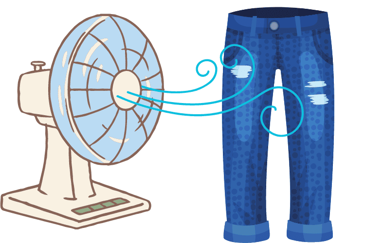 Use a fan to dry jeans